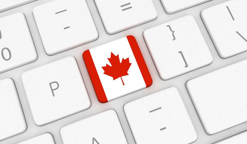 Canadian flag on laptop keyboard