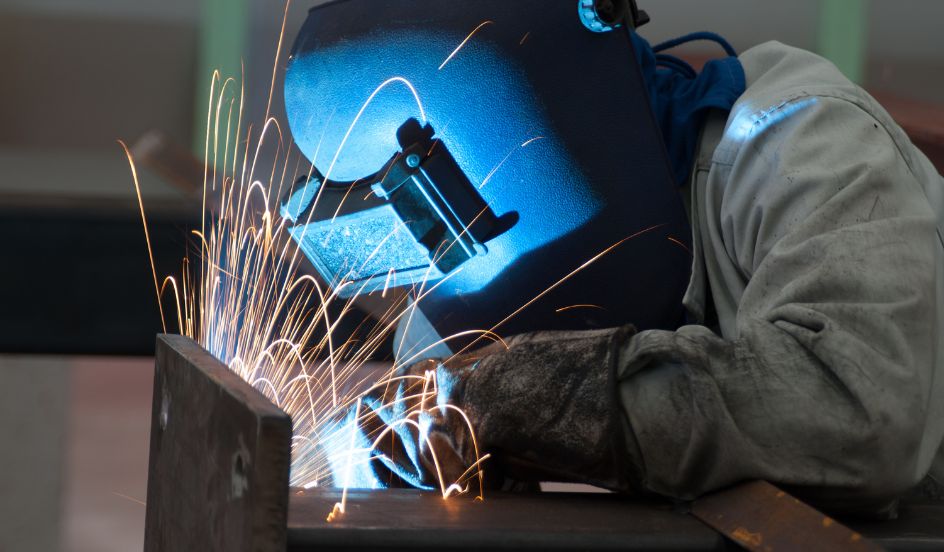 welder welding as sparks fly