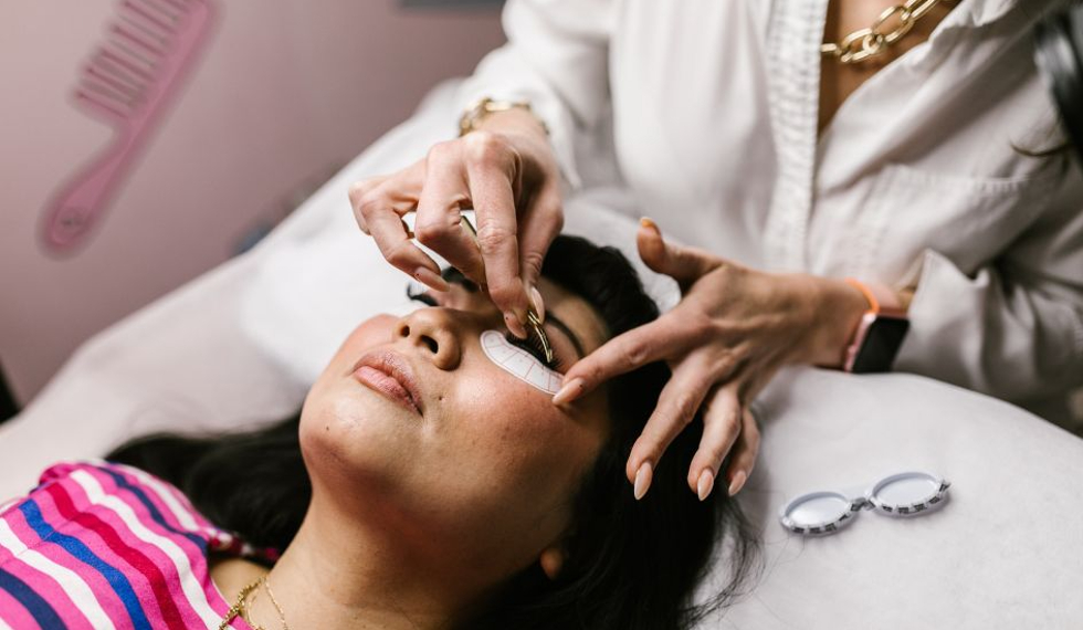 Lash Technician doing procedure on client